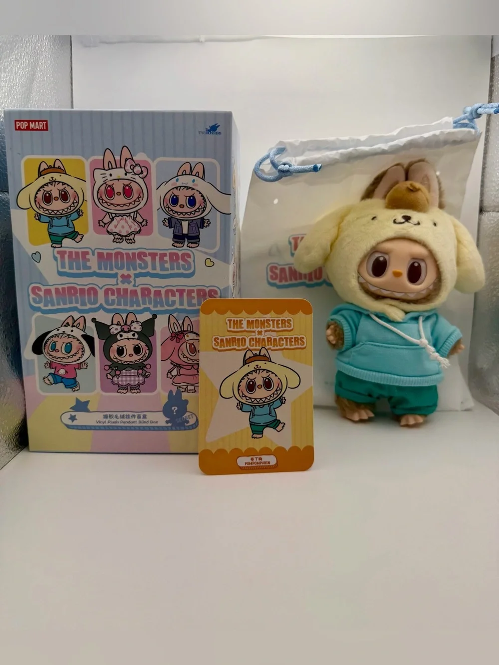 Authentic THE MONSTERS Hello Kitty and Friends - Vinyl Plush Pendant POMPOMPURIN